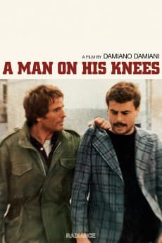 Un uomo in ginocchio